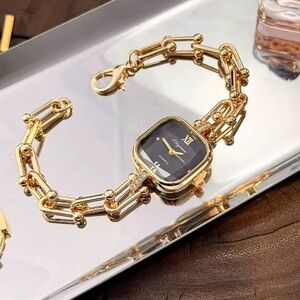 Graduated Link Classic Elegant Gold Black Women's Bracelet Watch